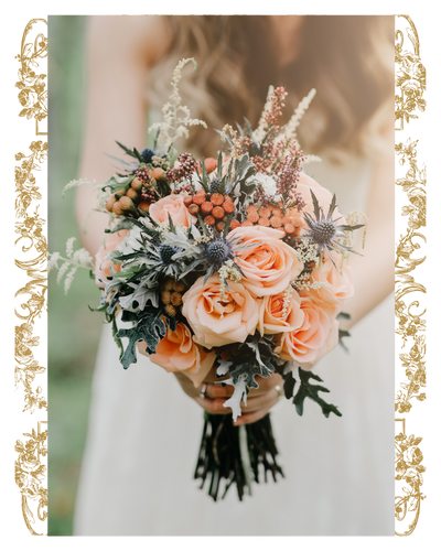 bride holding light pink bridal bouquet