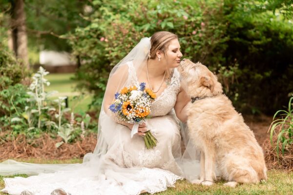 bride kissing her dog