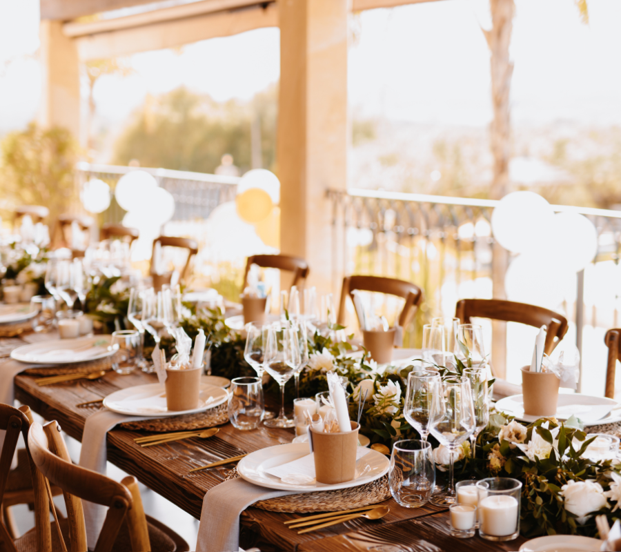 neutral wedding reception tablescape on wooden table